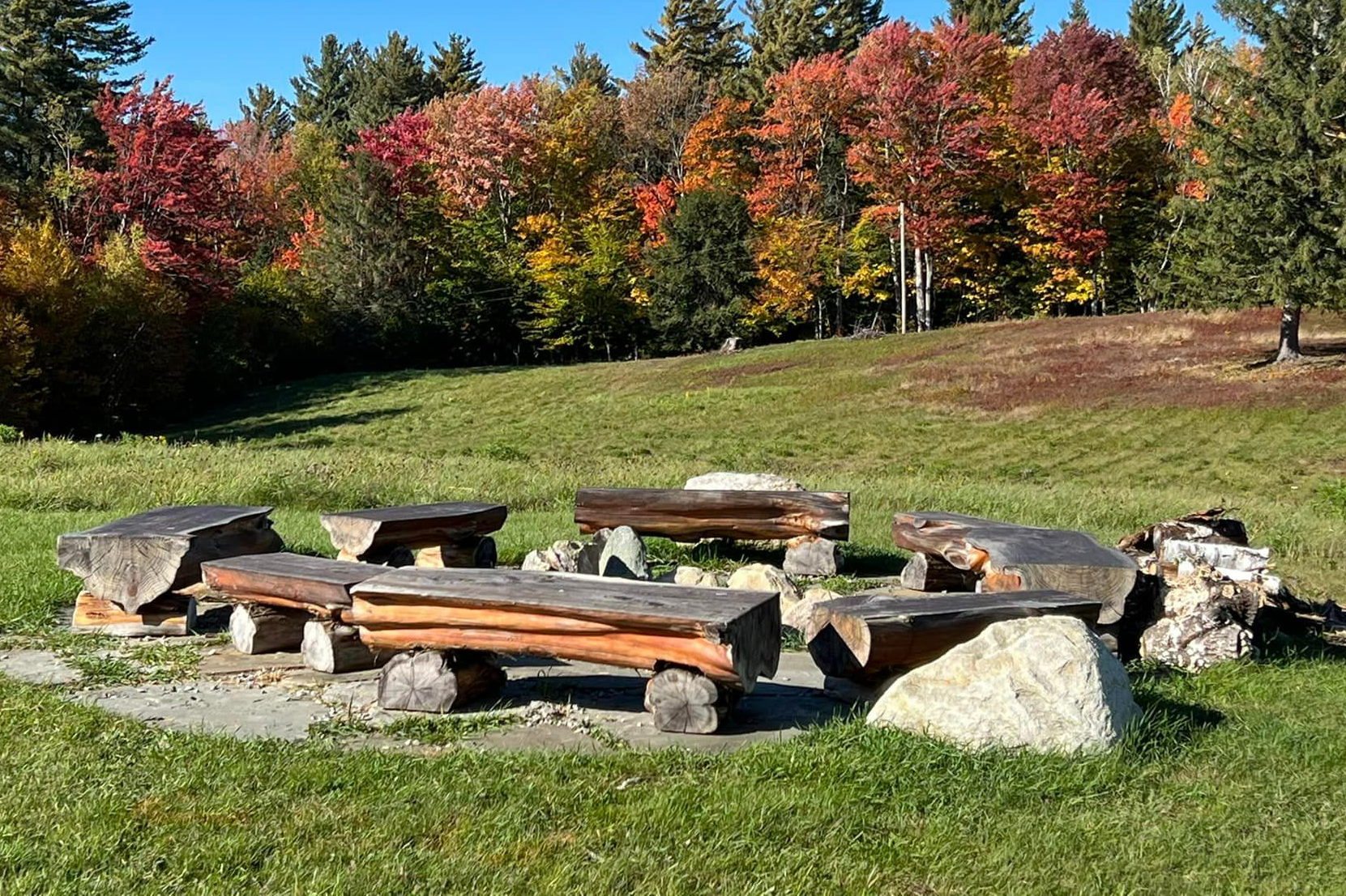 a fire pit in a field